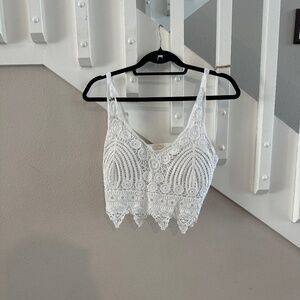 Beautiful knit white top by Rebellion Again